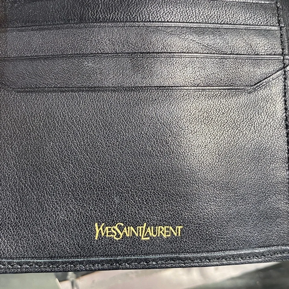 Authentic YSL Sleek black leather bifold wallet
